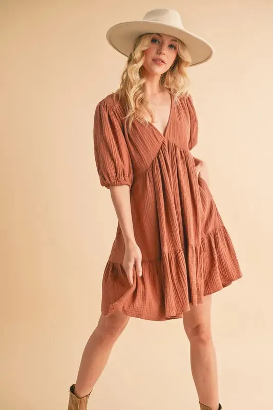 Aemi Co Tied Back Ruffled Short Sleeve Mini Dress