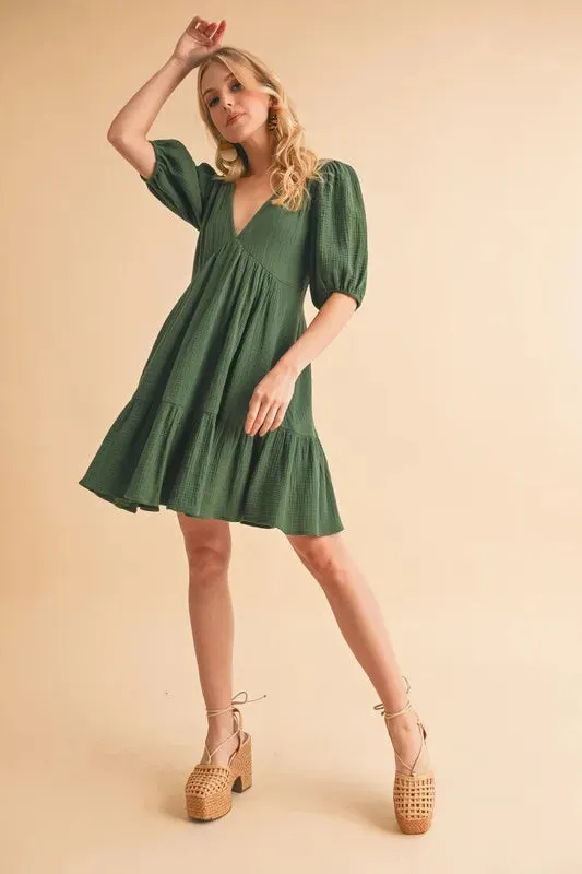 Aemi Co Tied Back Ruffled Short Sleeve Mini Dress