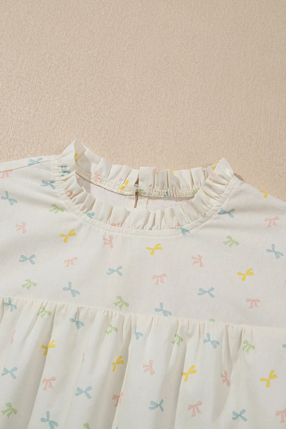 Beige Colorful Bow Printed Ruffled Flutter Sleeve Mock Neck Blouse