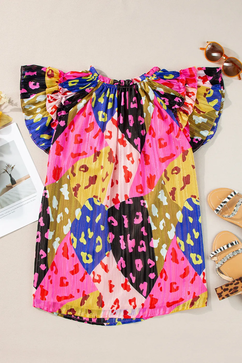Bradley Ruffled Printed Tie Neck Cap Sleeve Blouse