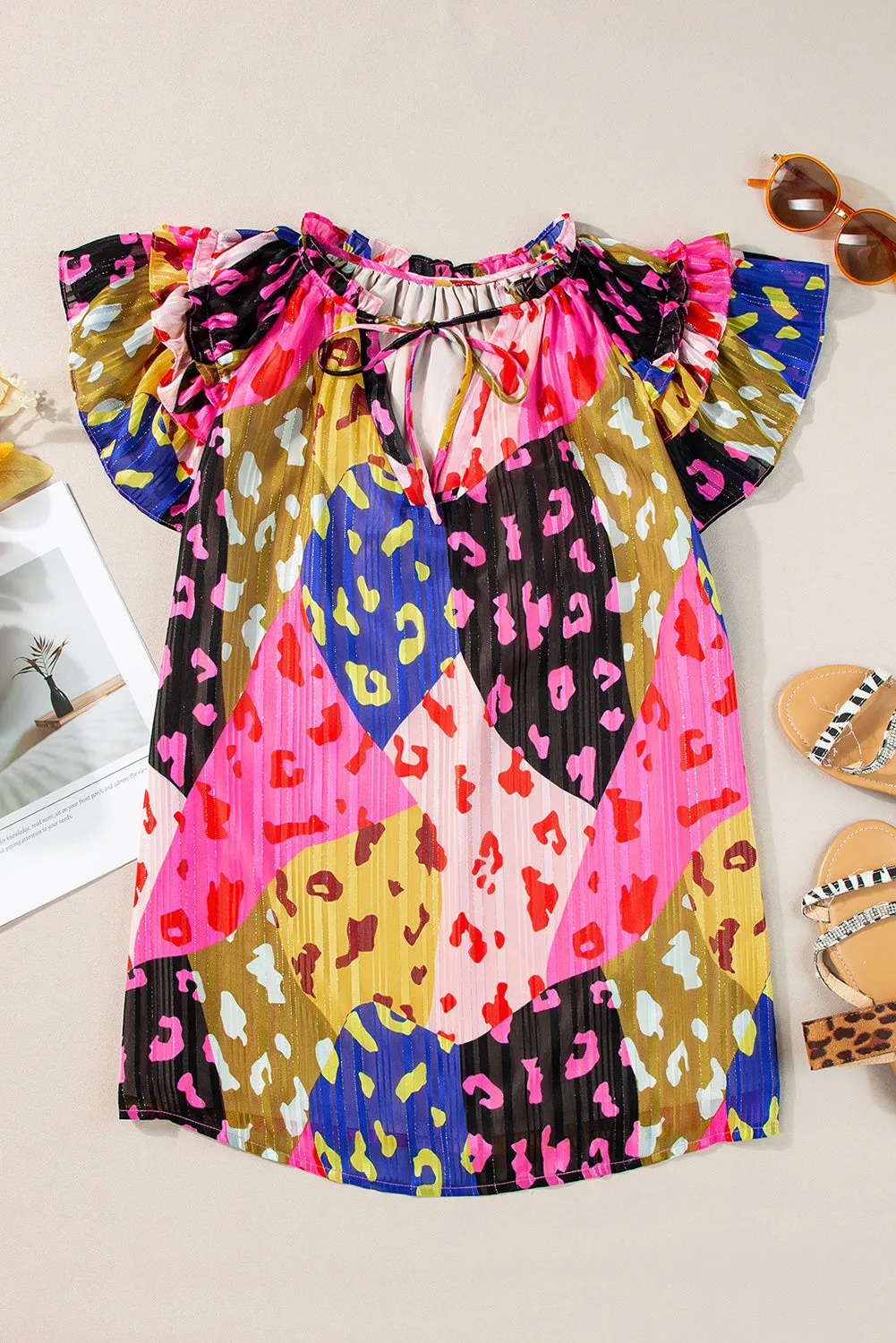 Bradley Ruffled Printed Tie Neck Cap Sleeve Blouse