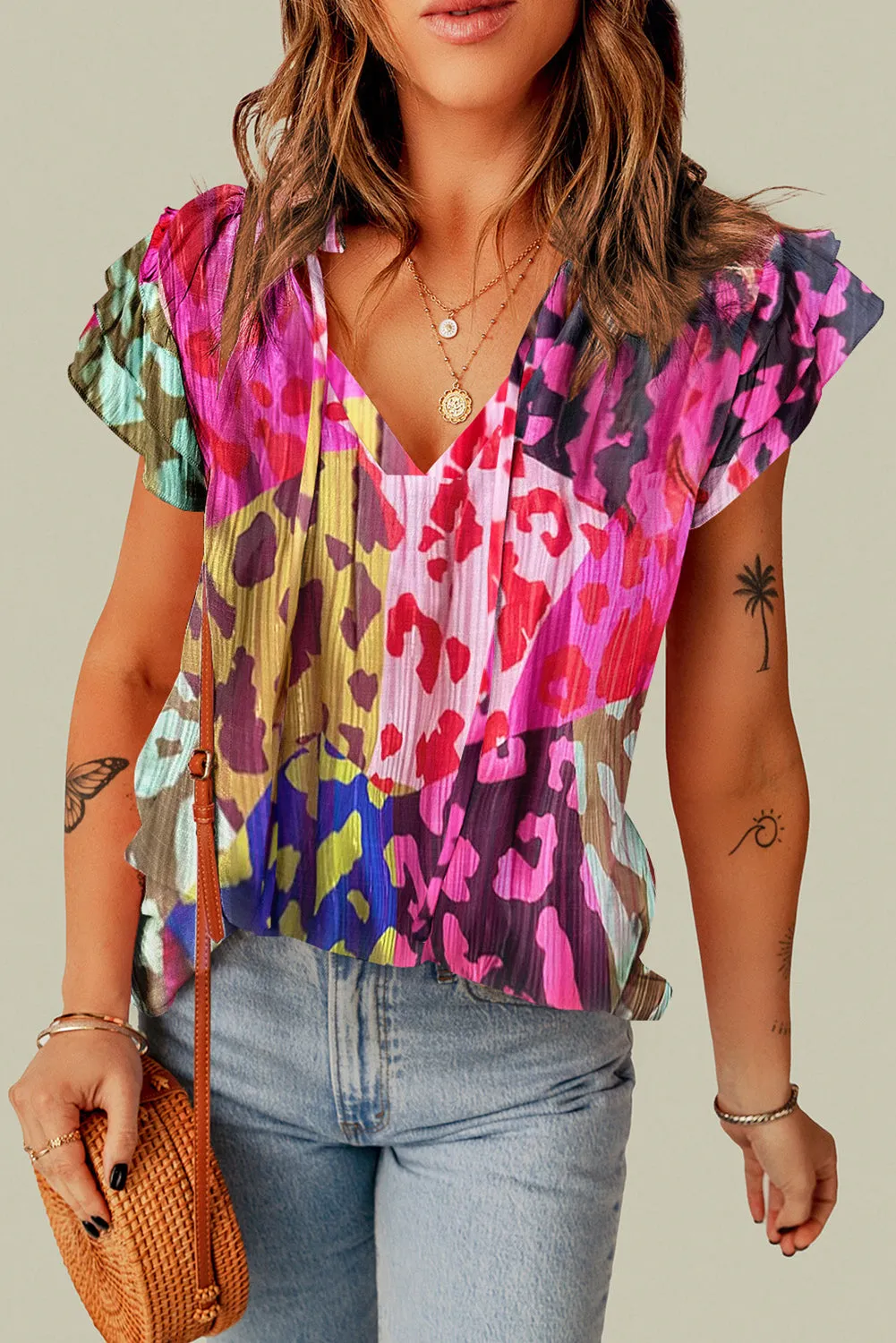 Bradley Ruffled Printed Tie Neck Cap Sleeve Blouse