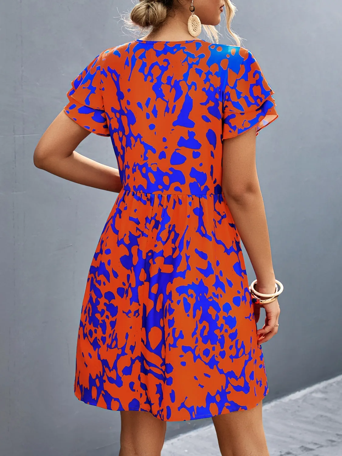 Cade Ruffled Printed V-Neck Short Sleeve Mini Dress