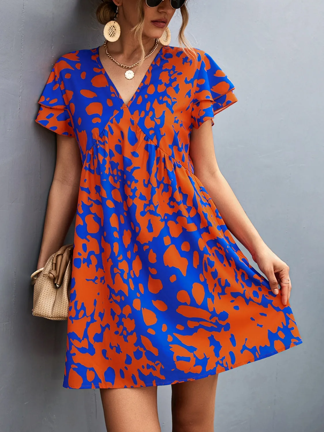 Cade Ruffled Printed V-Neck Short Sleeve Mini Dress