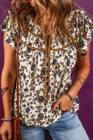 Hazel Blues® |  Ruffled Printed Tie Neck Cap Sleeve Blouse