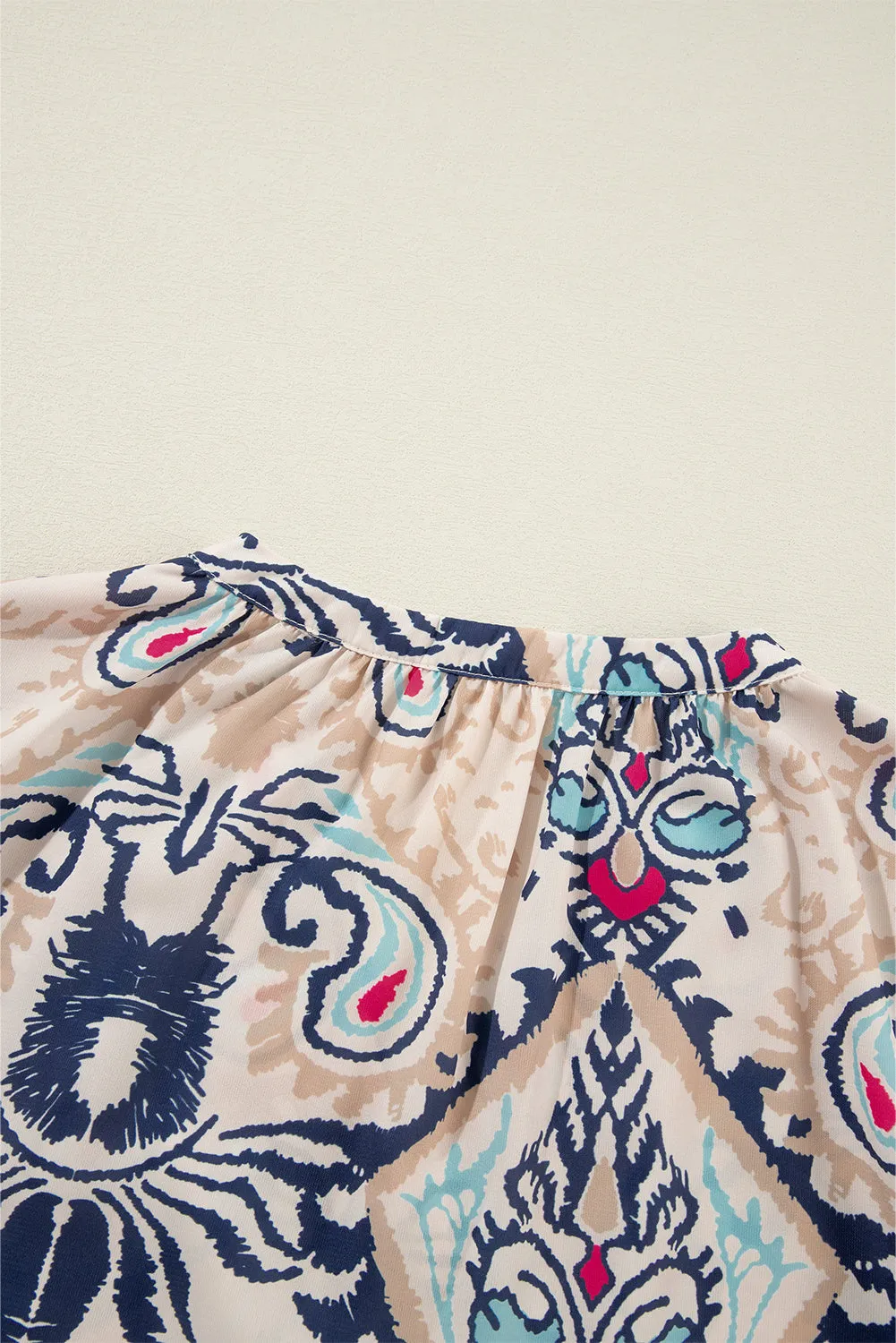 KaleaBoutique Abstract Printed Notched V Neck Split Half Sleeve Blouse