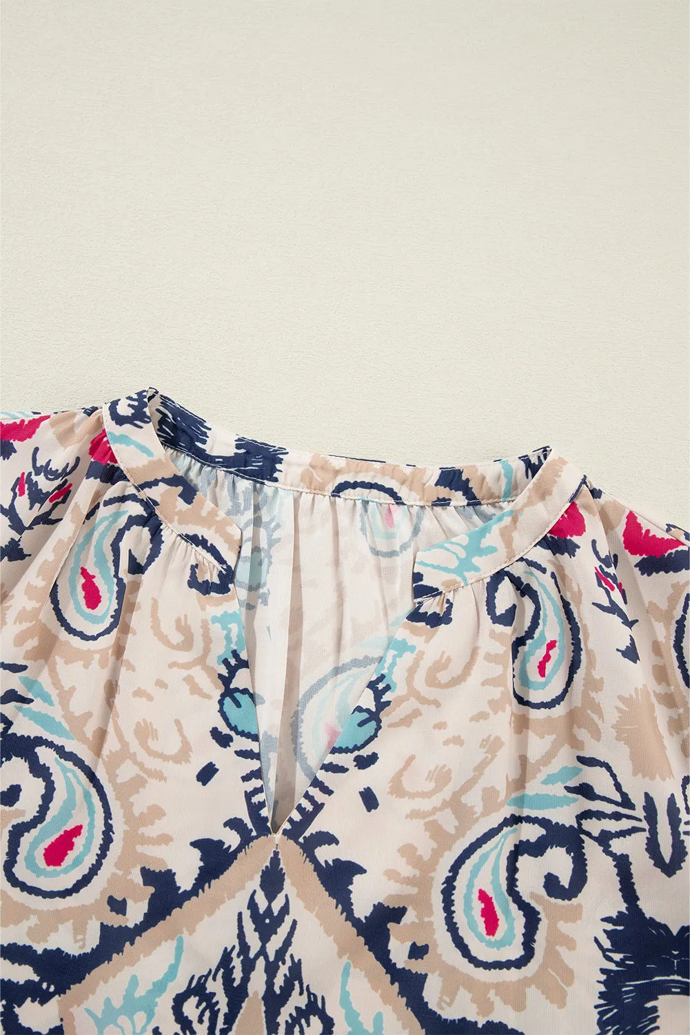 KaleaBoutique Abstract Printed Notched V Neck Split Half Sleeve Blouse