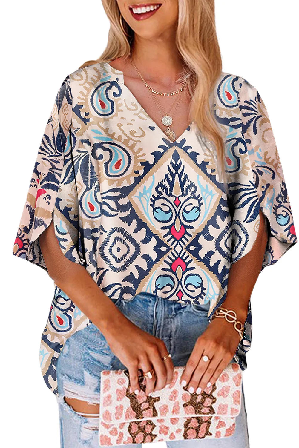 KaleaBoutique Abstract Printed Notched V Neck Split Half Sleeve Blouse