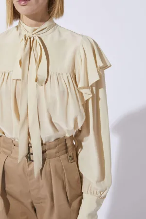 NUTS IVORY RUFFLE BLOUSE