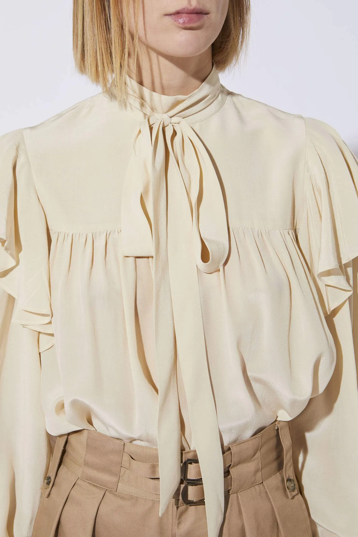 NUTS IVORY RUFFLE BLOUSE