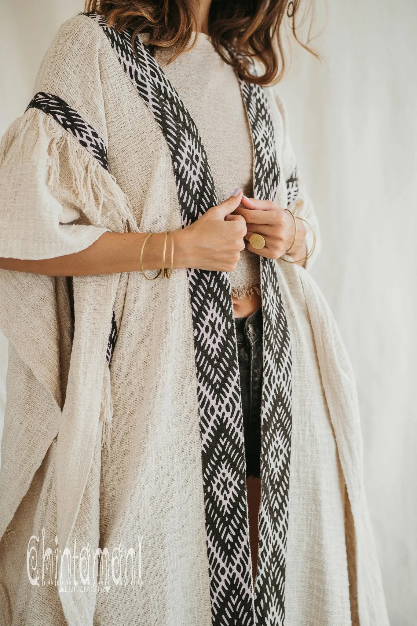 Poncho with tassels and hemp inserts / Off White