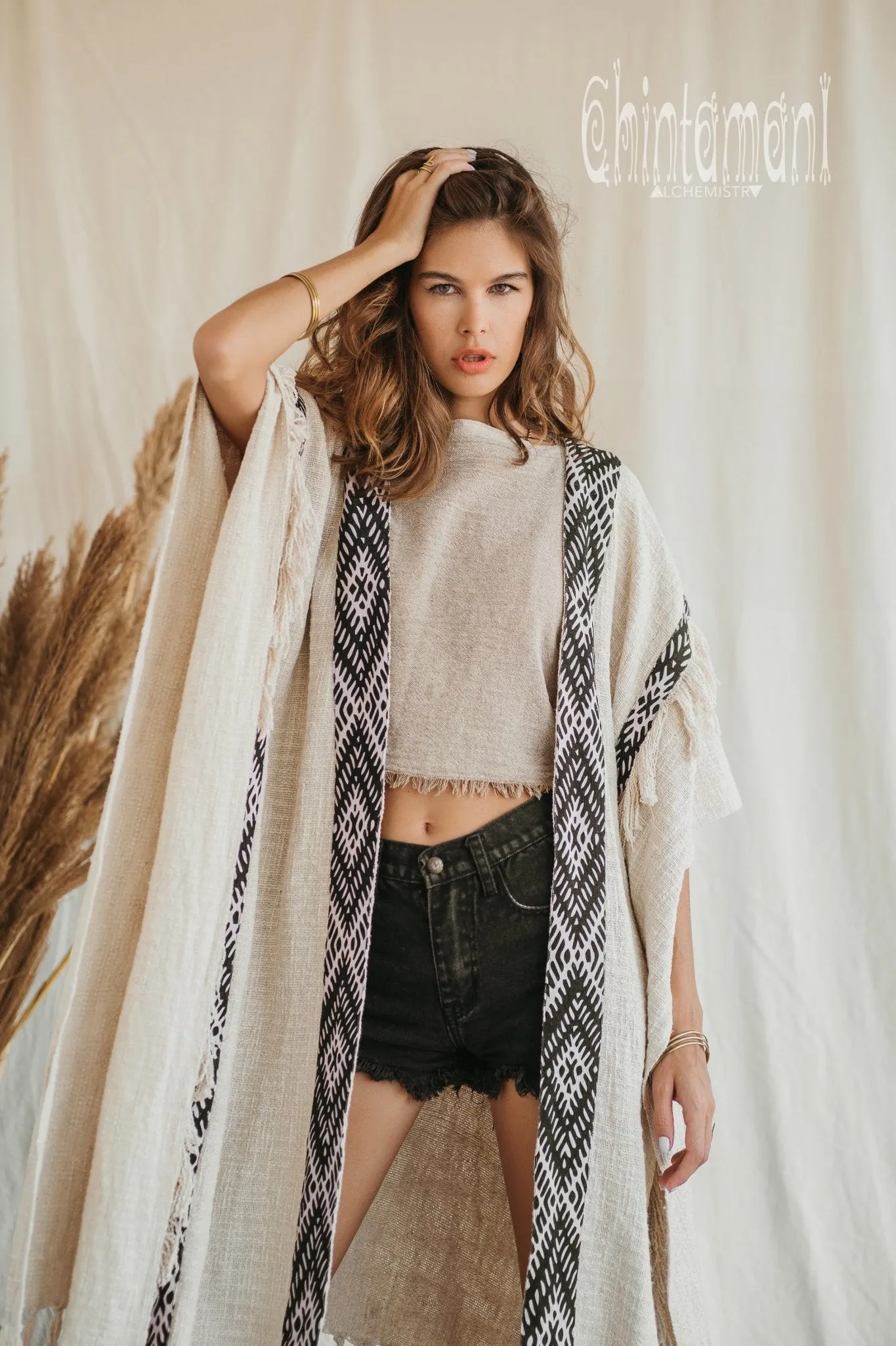 Poncho with tassels and hemp inserts / Off White