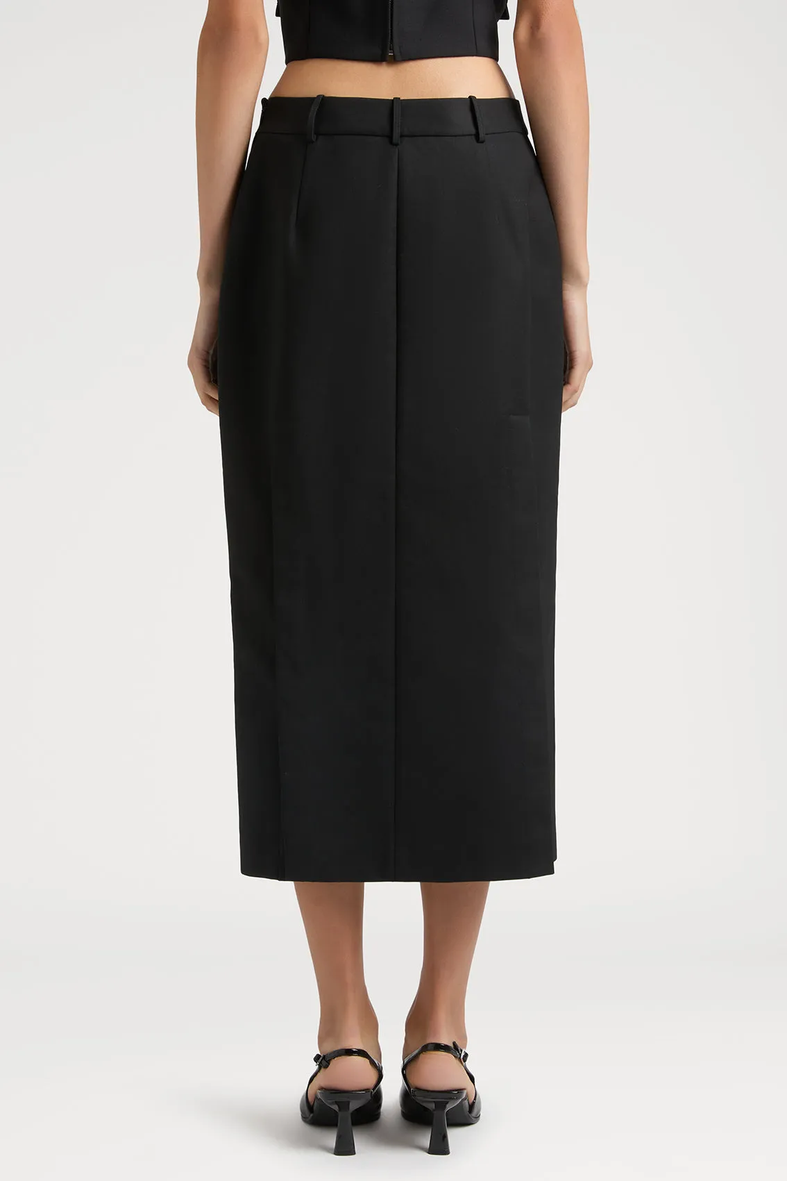 REFINED SKIRT SHOWCASING STYLISH CUT-OUT DETAILS AND BUTTON FEATURES